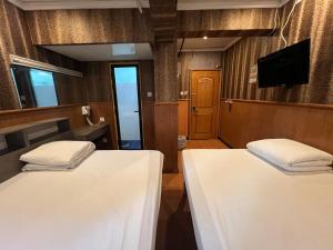 USA Hostel HONG KONG客房内的一张或多张床位