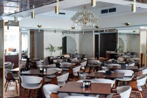 Um restaurante ou outro lugar para comer em Best Western Vilnius