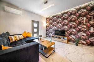 A television and/or entertainment centre at Seaside Apartments in Agkisaras 2