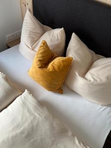 Ein Bett oder Betten in einem Zimmer der Unterkunft Franz Josefs Tinyhäuser