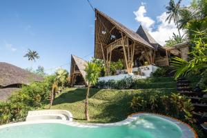 Bazén v ubytování Magic Hills Bali - Magical Eco-Luxury Lodge nebo v jeho okolí