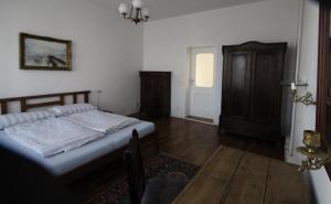 Ένα ή περισσότερα κρεβάτια σε δωμάτιο στο Landhaus am Teupitzsee