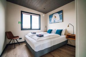 Katil atau katil-katil dalam bilik di Blue View Cabins