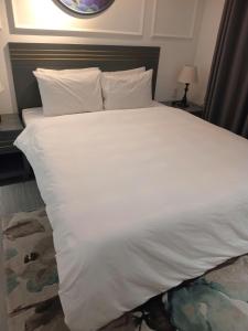 Postel nebo postele na pokoji v ubytování Con Meo Hostel
