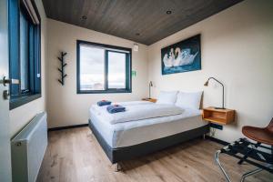 Una cama o camas en una habitación de Blue View Cabins