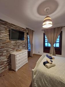Postel nebo postele na pokoji v ubytování Casa Joy
