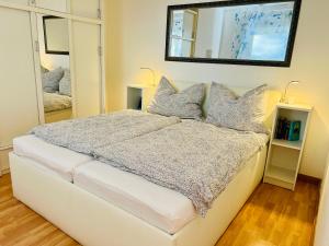 Postel nebo postele na pokoji v ubytování Alpenruhe Residenz + 15 fotografií