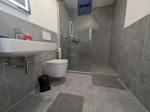 Ένα μπάνιο στο Modern Home Bad Wimpfen