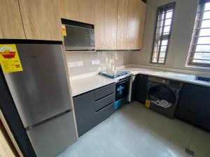 Afbeelding uit fotogalerij van Loci Purple Apartment in Dawhwenya