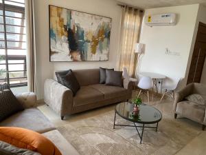 Afbeelding uit fotogalerij van Loci Purple Apartment in Dawhwenya