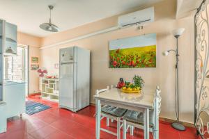 A kitchen or kitchenette at Una Araucaria sul mare