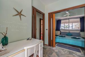 A bed or beds in a room at Una Araucaria sul mare