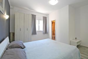 Postel nebo postele na pokoji v ubytování Apartment Dragomir 1052