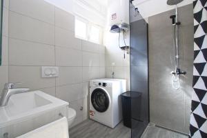 Koupelna v ubytování Apartment Dragomir 1052