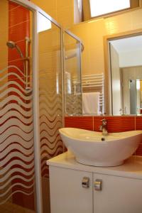 Kúpeľňa v ubytovaní Sétány Apartman