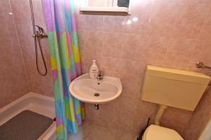 Koupelna v ubytování Apartment Dragomir 1052 + 27 fotografií