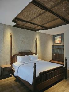 Ένα ή περισσότερα κρεβάτια σε δωμάτιο στο Minh House- 9 Phuoc Truong 7 +16 φωτογραφίες