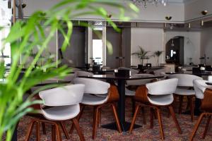 Um restaurante ou outro lugar para comer em Best Western Vilnius