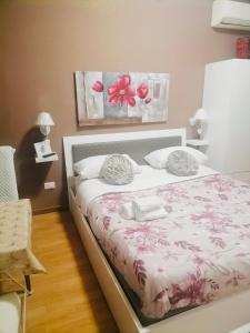 Letto o letti in una camera di Medea rooms palermo centro