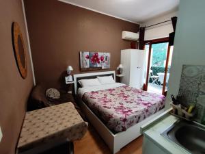Letto o letti in una camera di Medea rooms palermo centro