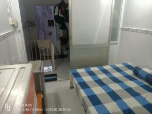 Rúm í herbergi á Hammock House Homestay