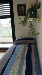 Postelja oz. postelje v sobi nastanitve B&B Il Vigneto