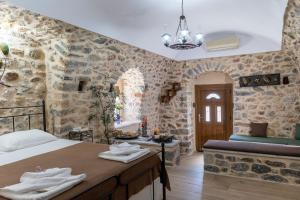 A bed or beds in a room at Stratis Tower since 1892