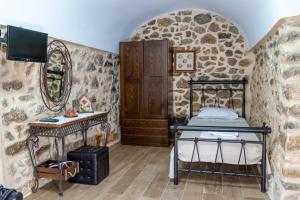 A bed or beds in a room at Stratis Tower since 1892
