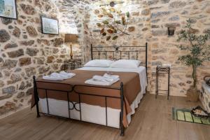 A bed or beds in a room at Stratis Tower since 1892