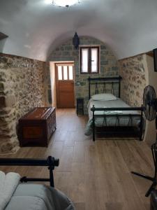 A bed or beds in a room at Stratis Tower since 1892