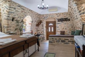 A bed or beds in a room at Stratis Tower since 1892