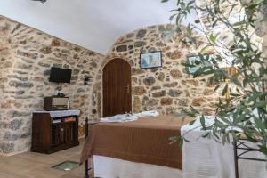 A bed or beds in a room at Stratis Tower since 1892