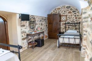 A bed or beds in a room at Stratis Tower since 1892