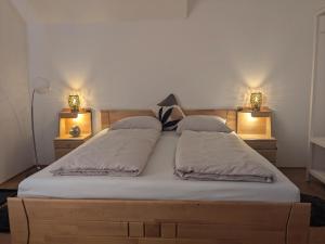 Ein Bett oder Betten in einem Zimmer der Unterkunft Stop & Sleep Ybbs