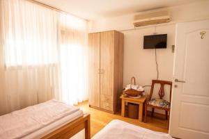 Postel nebo postele na pokoji v ubytování Kuća za odmor Vallirea