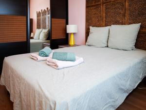 Ένα ή περισσότερα κρεβάτια σε δωμάτιο στο charmant appartement - 5 personnes - magnifique vue mer +17 φωτογραφίες