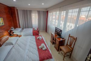 Katil atau katil-katil dalam bilik di Hotel Durham