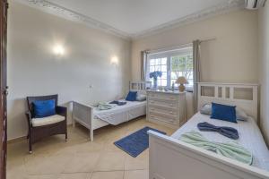 Postel nebo postele na pokoji v ubytování Casa Marinha 3 + 9 fotografií