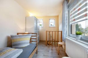 Postel nebo postele na pokoji v ubytování Ferienhaus Fichtelberg