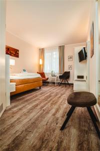 TV a/nebo společenská místnost v ubytování Hotel Wilhelmshöhe