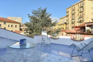 A balcony or terrace at La Bouganville Holiday House