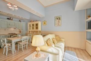 A kitchen or kitchenette at La Bouganville Holiday House