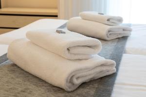 Postel nebo postele na pokoji v ubytování Atotxa Rooms