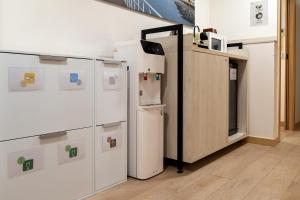 Kuchyň nebo kuchyňský kout v ubytování Atotxa Rooms