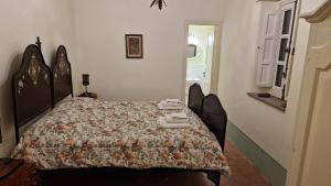 Posteľ alebo postele v izbe v ubytovaní La Casa del Mandorlo