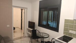 TV/trung tâm giải trí tại PERGOLA HOUSE 3 BDR heart