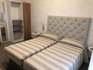 Postel nebo postele na pokoji v ubytování New H Marte 81