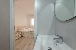 Koupelna v ubytování Apartamento Victoria home + 30 fotografií