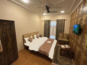 Katil atau katil-katil dalam bilik di Faizzy residency