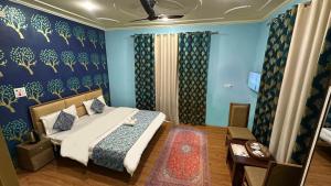 Katil atau katil-katil dalam bilik di Faizzy residency